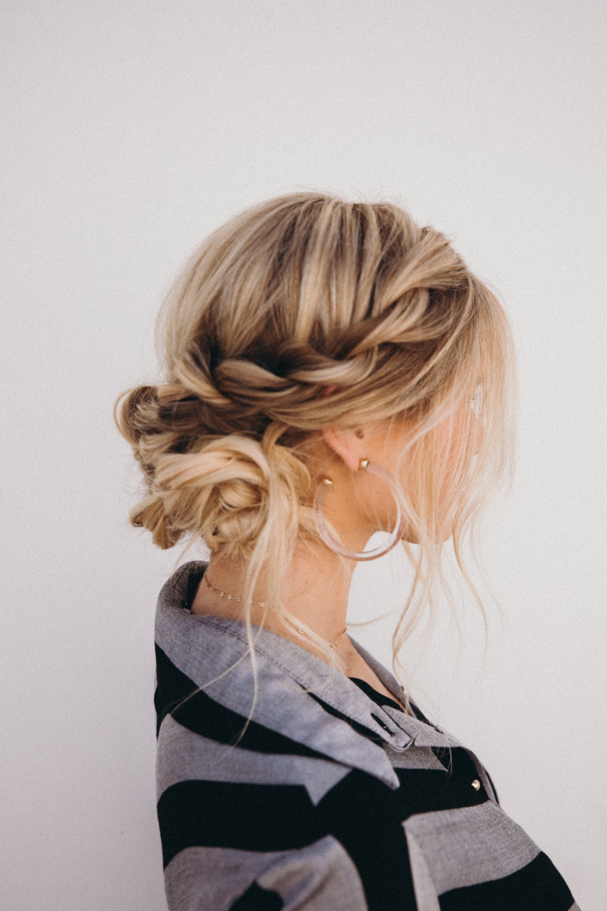 Double twist low bun hairstyle for women